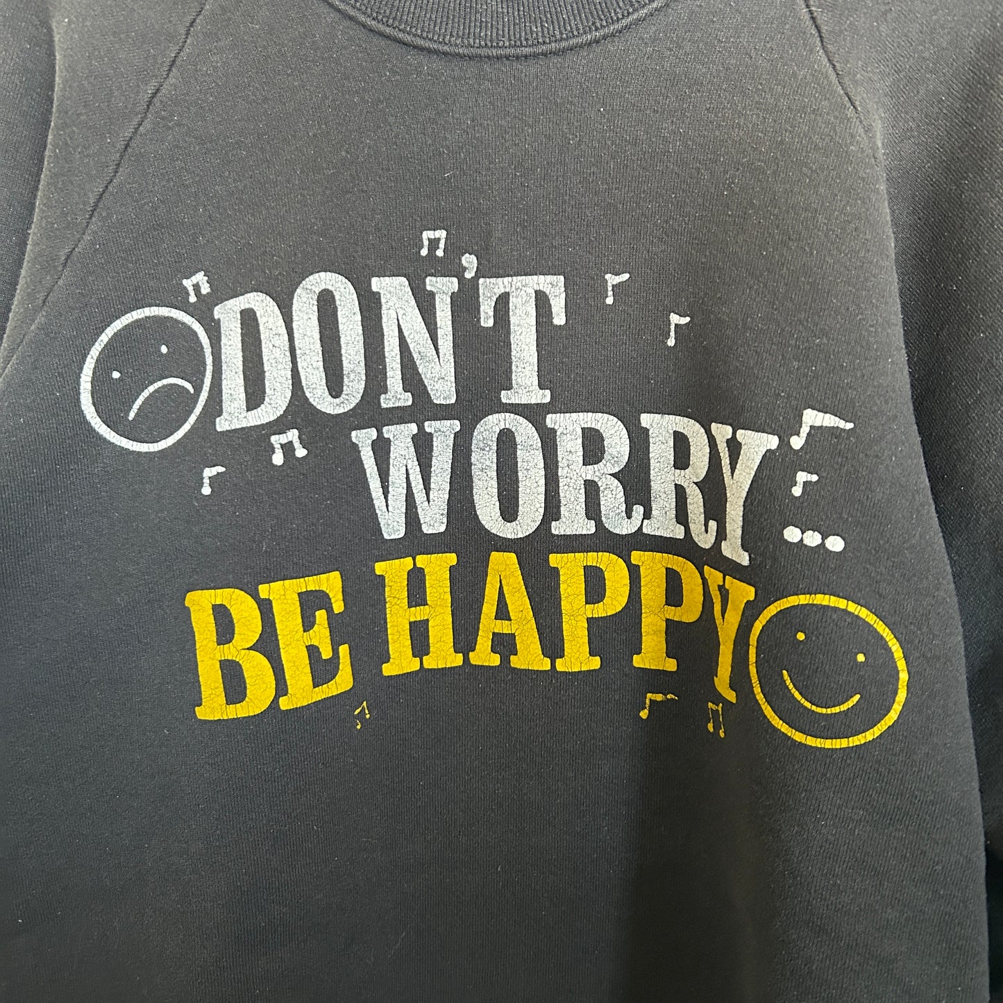 90's Screen stars "Don't worry Be Happy" ラグランスウェット 黒 (XL)/A8179S-SO