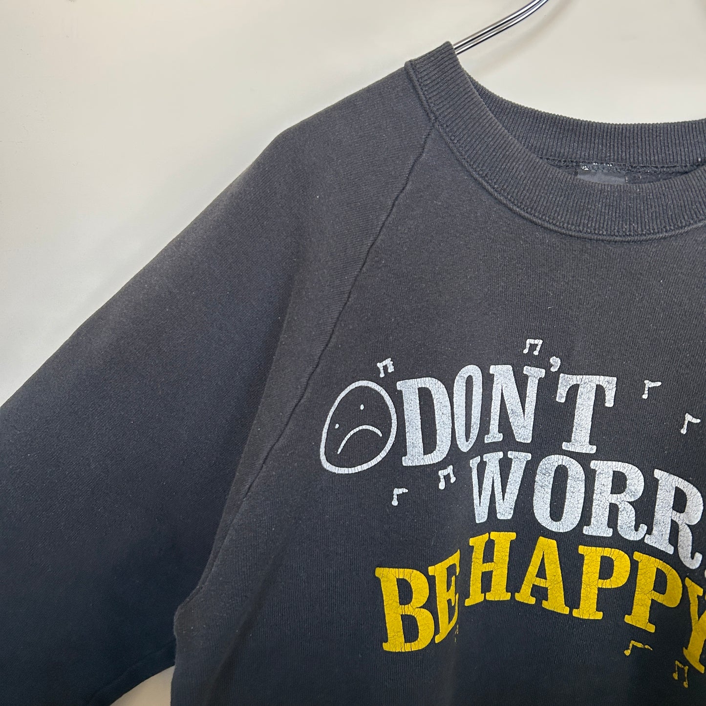 90's Screen stars "Don't worry Be Happy" ラグランスウェット 黒 (XL)/A8179S-SO